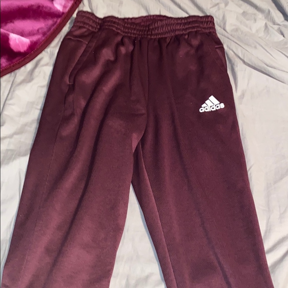 Maroon Adidas sweatpants
